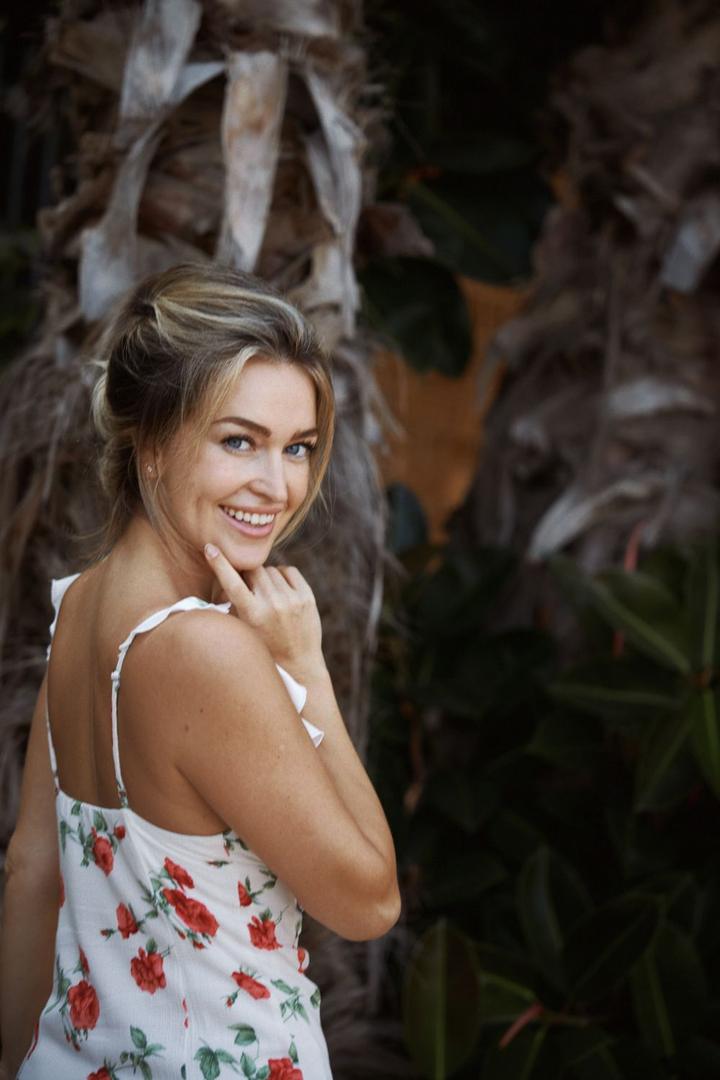Smiling blonde woman on a walk in Jaffa